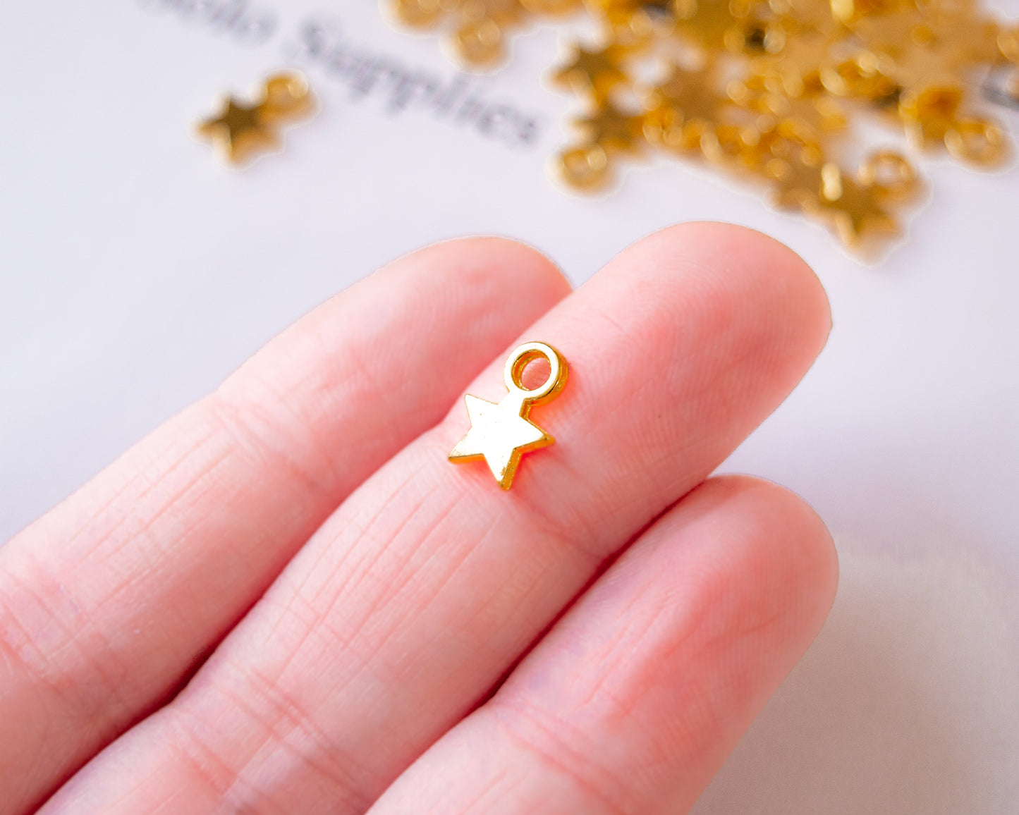 Tiny 10mm Star Charms in Gold Color