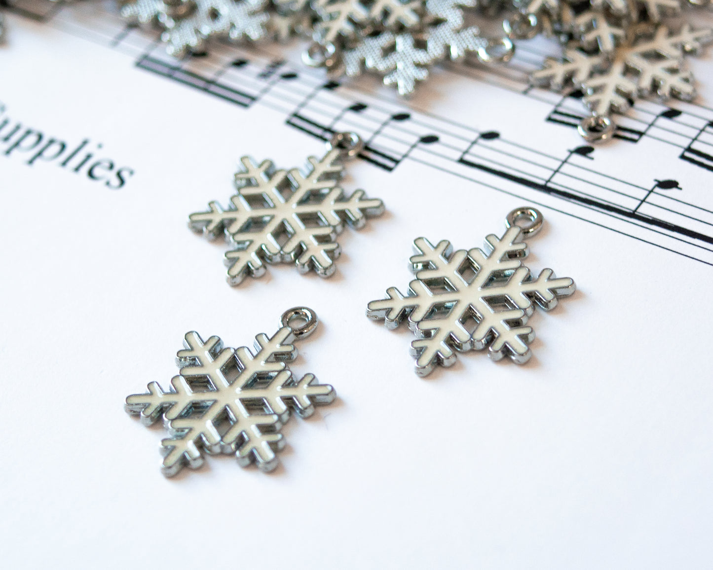 Snowflake Charms with White Enamel, 25mm Long, Platinum Colored Metal